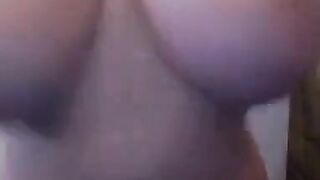 Big-Titted Cam Girl Flashes Her Assets