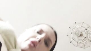 Big-titted brunette cums while trying to insert raisin