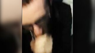 Bearded Guy Sucks Interracial Cock in a Public Restroom