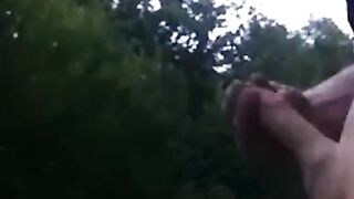 Outdoor Handjob for a Big-Cocked Hunk