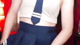 Asian shemale schoolgirl jerks off