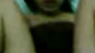 Malaysian girl in a close-up amateur video.