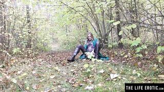 Exhibitionist peeing inside the woods as she rubs her pussy