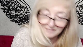 Blonde MILF IngritSno with glasses performs on webcam clothed