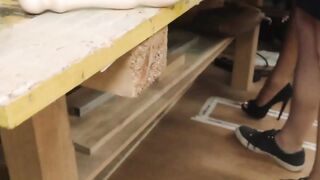 Brunettes fucking inside a shop