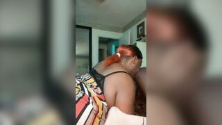 Huge Boobed ebony whore licks her man’s ass and balls