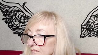 Blonde amateur MILF IngritSno with glasses on webcam