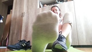 Sweaty Toes after Workout. Stinky Socks and Sneakers.sniffing - OlgaNovem