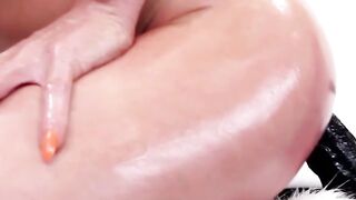 Deviant Jamie French bouncing on big black dildo