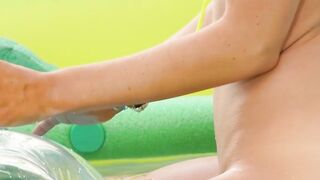 Big boobed teen posing naked in the pool