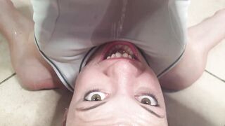 Slim women pee on her own face and into her