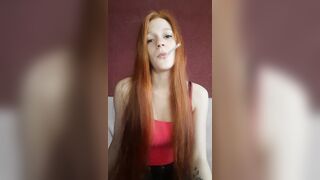cunt with mouth with Red Hair Smokes a Cigarette
