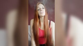 cunt with mouth with Red Hair Smokes a Cigarette