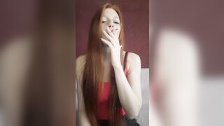cunt with mouth with Red Hair Smokes a Cigarette