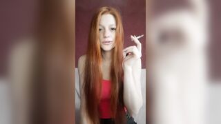 cunt with mouth with Red Hair Smokes a Cigarette