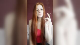 cunt with mouth with Red Hair Smokes a Cigarette