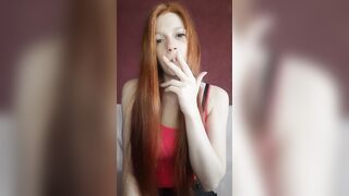 cunt with mouth with Red Hair Smokes a Cigarette