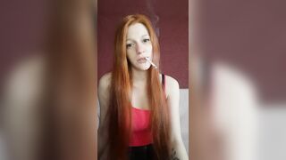 cunt with mouth with Red Hair Smokes a Cigarette