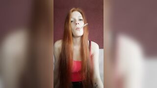 cunt with mouth with Red Hair Smokes a Cigarette