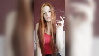 cunt with mouth with Red Hair Smokes a Cigarette