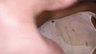 Black haired teen deepthroats a big and veiny dick