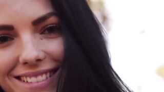 Nubile is spreading her shaved pussy while in the forest