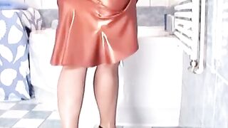 Dashing dyke teases showering in tight latex and high heels