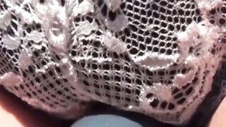Beautiful Asian babe outdoor plays with pussy before pissing