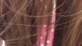 Gorgeous Asian babe outdoor rubbing hairy pussy and pissing