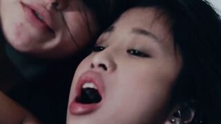 Cute Asian girl and her lesbian girlfriend lick each other