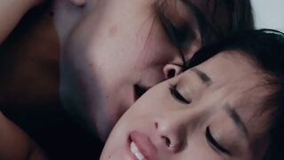 Cute Asian girl and her lesbian girlfriend lick each other