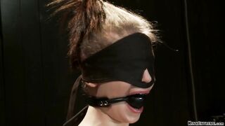 Blindfolded red haired gets punishment