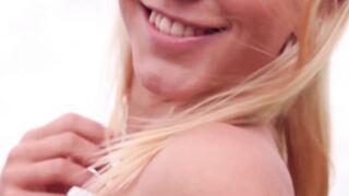 Seaside teasing with a lovely teen blonde with small curves
