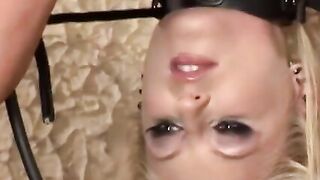 Lesbian restrained and gagged before teasing BDSM spanking