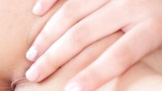 Barely legal brunette moans while masturbating
