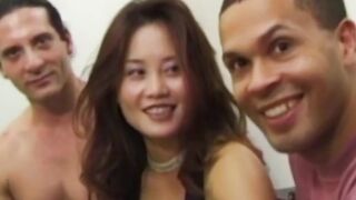 Classic Asian cutie stretched vigorously with two big dicks