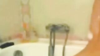 Busty Amateur's Shower Cam Show