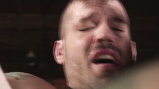 Cliff strokes Bucks cock and tugs on the chains