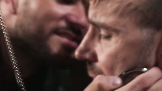 Cliff strokes Bucks cock and tugs on the chains