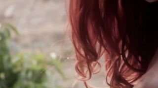 Pale redhead shows off her impeccable hips and her titties