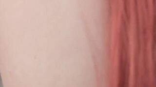 Pale redhead shows off her impeccable hips and her titties