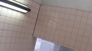 Japanese babes caught on tape while pissing in public toilet