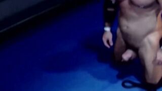Tattooed wrestler tied up and dominated by his opponent