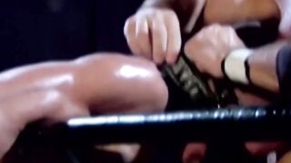 Tattooed wrestler tied up and dominated by his opponent