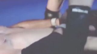 Tattooed wrestler tied up and dominated by his opponent