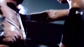 Tattooed wrestler tied up and dominated by his opponent