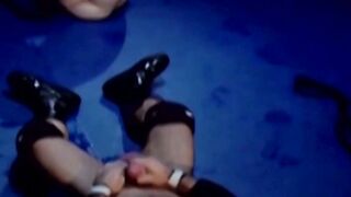 Tattooed wrestler tied up and dominated by his opponent