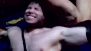 Tattooed wrestler tied up and dominated by his opponent