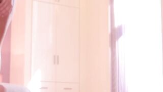 Playful teen in sexy lingerie enjoys stripping and caressing