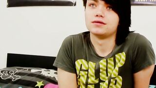 Young gay man with long hair strokes it hard